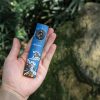 Olight Arkfeld Pro 3R Paw Edition Rechargeable Flashlight